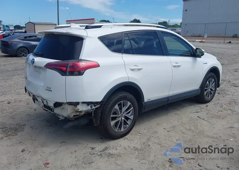 2016 Toyota Rav4 Hybrid Xle z USA, uszkodzony, nr VIN JTMRJREV7GD030659